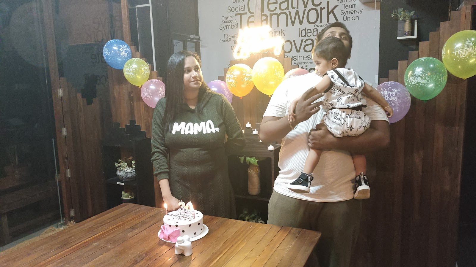 A family anniversary celebration with cake at Forwords